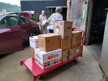 Gene dropping off Llanfair’s recycling to the Cincinnati Recycling & Reuse Hub